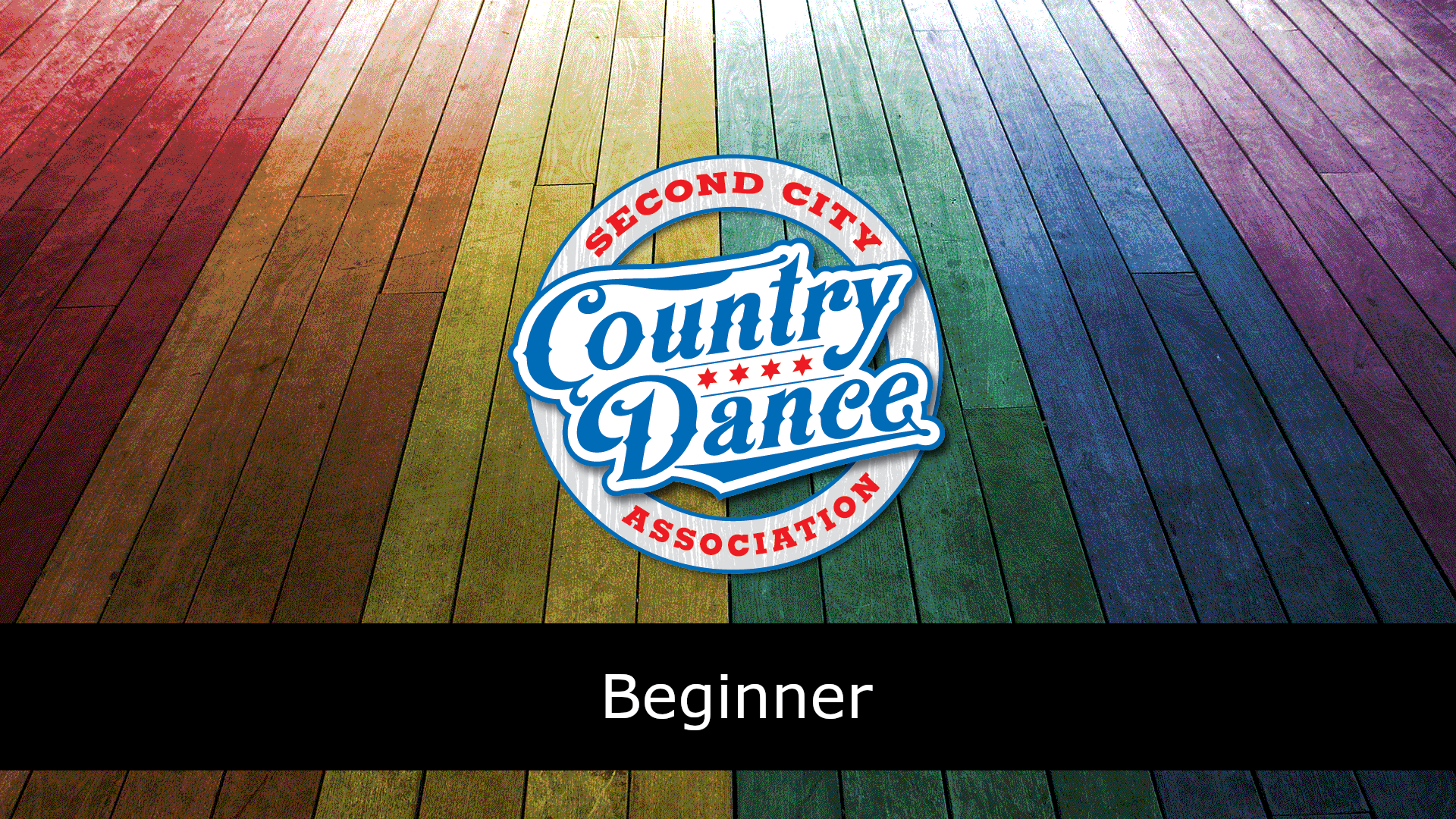 A circular logo that says ‘Second City Country Dance Association’ sits in the center of the image against a wood-paneled rainbow background. The logo is red, white, and blue in shades inspired by the Chicago flag. Along the bottom of the image is a black bar with text indicating the dance is a difficulty level of beginner.