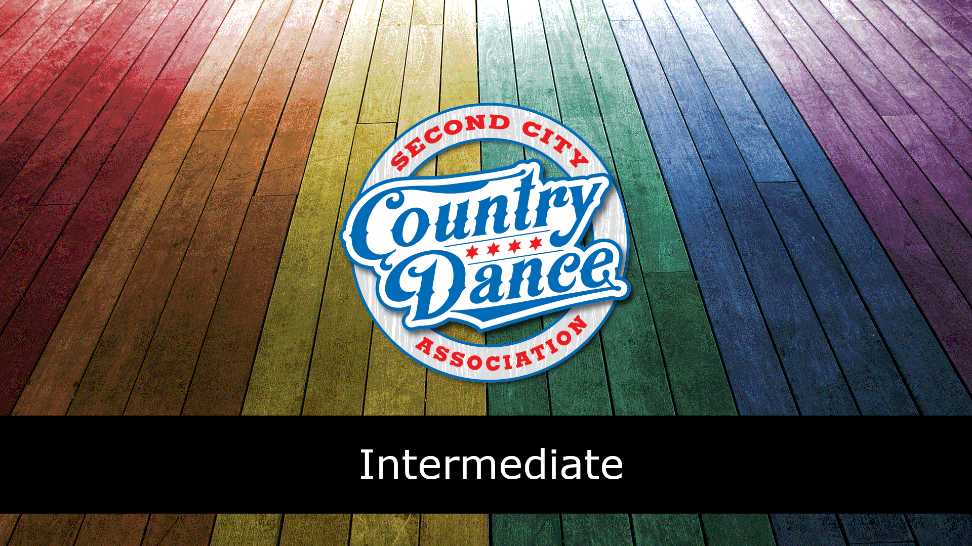 A circular logo that says ‘Second City Country Dance Association’ sits in the center of the image against a wood-paneled rainbow background. The logo is red, white, and blue in shades inspired by the Chicago flag. Along the bottom of the image is a black bar with text indicating the dance is a difficulty level of intermediate.